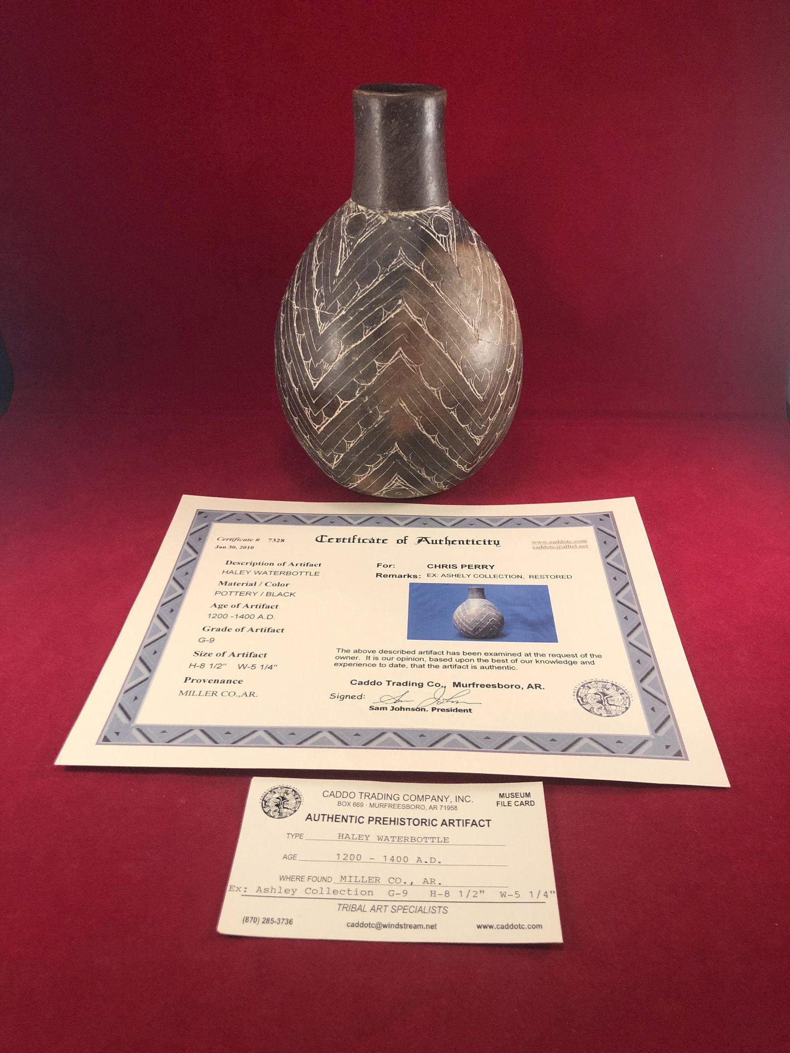 HALEY WATERBOTTLE POTTERY WITH COA: THIS BEAUTIFUL NATIVE AMERICAN INDIAN ARTIFACT IS 8&1/2 INCHES TALL BY 5&1/4 INCHES WIDE. IT IS FROM MILLER COUNTY ARKANSAS. IT HAS BEEN RESTORED. THIS WONDERFUL COLLECTION BELONGED TO CHRIS PERRY ALS