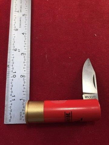 WINCHESTER KNIFE: THIS KNIFE IS IN THE SHAPE OF A SHOTGUN SHELL. MADE IN ITALY.