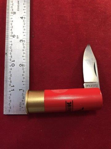 WINCHESTER KNIFE: THIS KNIFE IS IN THE SHAPE OF A SHOTGUN SHELL. MADE IN ITALY.