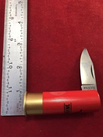 WINCHESTER KNIFE: THIS KNIFE IS IN THE SHAPE OF A SHOTGUN SHELL. MADE IN ITALY.