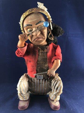 ANTIQUE DRUMMER METAL TOY: THIS BEAUTIFUL PIECE IS 11 INCHES LONG. IT WILL MAKE A GREAT ADDITION TO YOUR COLLECTION! KEY WORDS: NATIVE AMERICAN INDIAN ARTIFACT ARTIFACTS ARROWHEAD ARROWHEADS MISSISSIPPIAN QUAPAW CADDO POTTERY