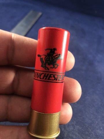 WINCHESTER KNIFE IN SHAPE OF SHOTGUN SHELL (1 of 2)