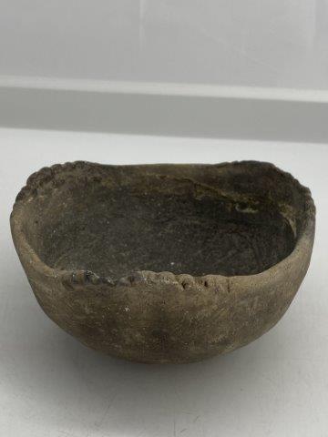 Small Three Pointed Mississippian Bowl: This Small Three Pointed Mississippian Bowl is from the late Dub Lyerly collection. It appears solid with some minor rim chips. It is 2&3/4 inches tall by 4&1/2 inches wide. All items have been examin