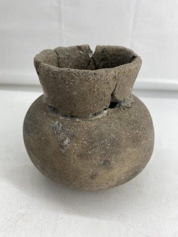 Mississippian Jar: This Mississippian Jar is from the CTC Collection. It is broken and glued with some pieces missing. It is 4 & 3/4 inches tall by 5 inches wide. All items have been examined by Sam Johnson and are auth