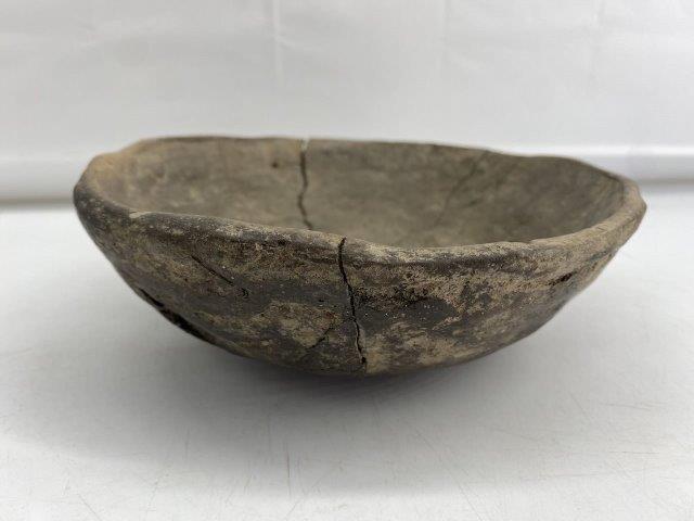 Mississippian Bowl: This Mississippian Bowl is from the CTC Collection and has pressure cracks and normal use wear. It is 2 & 3/4 inches tall by 7 & 1/4 inches wide. All items have been examined by Sam Johnson and are au