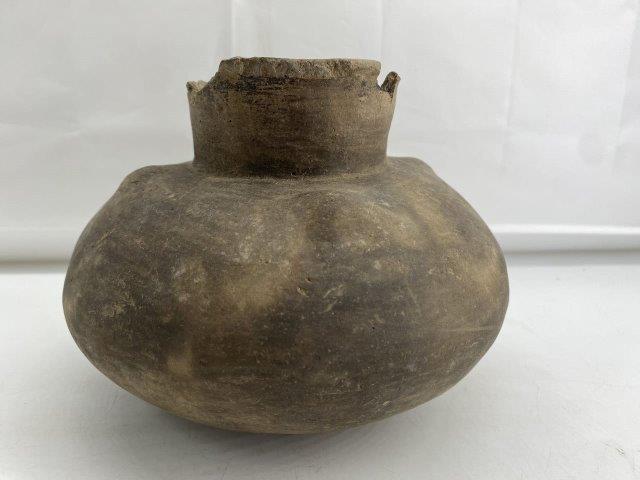 Mississippian Bottle: This Mississippian Bottle is from the CTC Collection it has a flared neck that has repair and a missing piece. It is 6 inches tall by 7 inches wide. All items have been examined by Sam Johnson and are