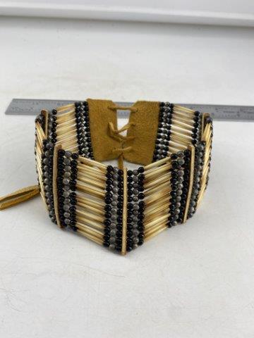 Beaded Choker Indian Artifact Arrowhead: This is 12 inches long. It is from Montana. KEY WORDS: NATIVE AMERICAN INDIAN ARTIFACT ARTIFACTS ARROWHEAD ARROWHEADS MISSISSIPPIAN QUAPAW CADDO POTTERY COINS