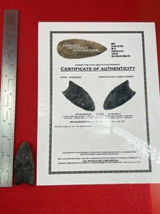 Clovis with COA: This is 2&13/16 inches long. It is from Clark County Ohio. Ex- Steve Wilson collection. It comes with an Insight Laser Artifact Certificate of Authenticity. KEY WORDS: NATIVE AMERICAN INDIAN ARTIFACT