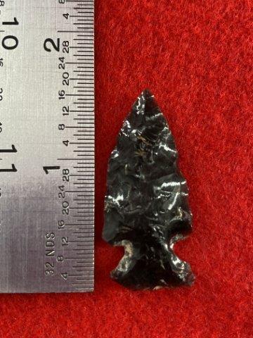 Obsidian Point Indian Artifact Arrowhead: This is 1&1/2 inches long. It is from Oregon. KEY WORDS: NATIVE AMERICAN INDIAN ARTIFACT ARTIFACTS ARROWHEAD ARROWHEADS MISSISSIPPIAN QUAPAW CADDO POTTERY COINS