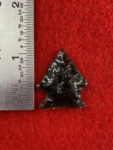 Obsidian Point Indian Artifact Arrowhead: This is 1&1/8 inches long. It is from Oregon. KEY WORDS: NATIVE AMERICAN INDIAN ARTIFACT ARTIFACTS ARROWHEAD ARROWHEADS MISSISSIPPIAN QUAPAW CADDO POTTERY COINS