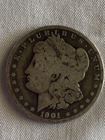 Morgan Silver Dollar: Please see picture for year & mint mark. KEY WORDS: NATIVE AMERICAN INDIAN ARTIFACT ARTIFACTS ARROWHEAD ARROWHEADS MISSISSIPPIAN QUAPAW CADDO POTTERY COINS MORGAN DOLLAR PEACE DOLLAR SILVER COINS