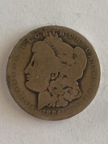 1884 Morgan Silver Dollar: Please see picture for Date & Mint Mark. KEY WORDS: NATIVE AMERICAN INDIAN ARTIFACT ARTIFACTS ARROWHEAD ARROWHEADS MISSISSIPPIAN QUAPAW CADDO POTTERY COINS MORGAN DOLLAR PEACE DOLLAR SILVER COINS