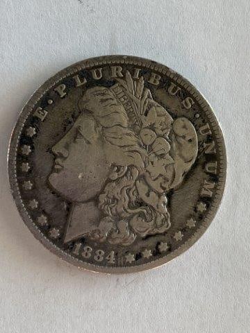 1884 Morgan Silver Dollar: Please see picture for Date & Mint Mark. KEY WORDS: NATIVE AMERICAN INDIAN ARTIFACT ARTIFACTS ARROWHEAD ARROWHEADS MISSISSIPPIAN QUAPAW CADDO POTTERY COINS MORGAN DOLLAR PEACE DOLLAR SILVER COINS