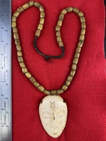 Trade Bead Necklace with Bone Human Face Effigy