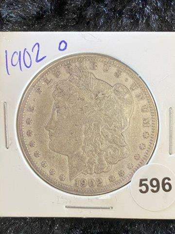 1902 O Morgan Silver Dollar: Give us a call to consign your items 501-590-6771. Taking in consignments daily.