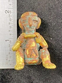 Pre-Columbian Seated Man with a Drum Alloy unknown material