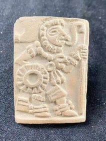 Authentic Pre-Columbian Seal Stamp. Shows male figure with shield, spesr, & decorations on ankles
