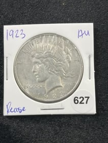 1923 AU Peace Silver Dollar Coin