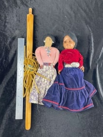 2 Dolls and a Wooden Pipe Stem