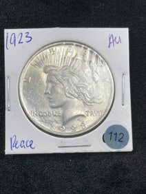 1923 AU Peace Silver Dollar Coin