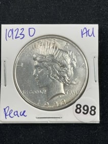 1923 D AU Peace Silver Dollar Coin