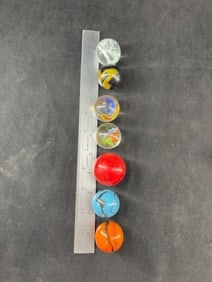 7 Large Marbles