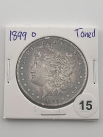 1899 O Toned Morgan Silver Dollar Coin