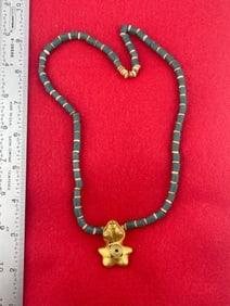 Trade Bead necklace with Tumbaga Tairona Gold Figurine Riker frame included UNKNOWN MATERIAL