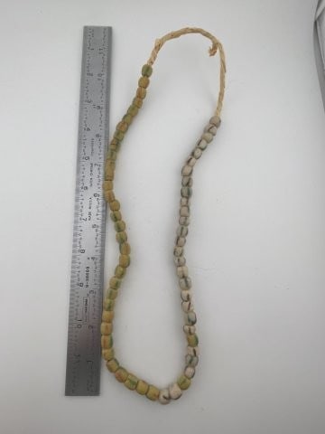 Trade Bead Necklace: KEY WORDS: INDIAN ARTIFACT ARTIFACTS ARROWHEAD ARROWHEADS NATIVE AMERICAN MISSISSIPPIAN QUAPAW CADDO POTTERY COINS MORGAN DOLLAR PEACE DOLLAR SILVER COINS Arkansas. Now taking in consignments for pre-