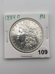 1884 O AU Morgan Silver Dollar Coin