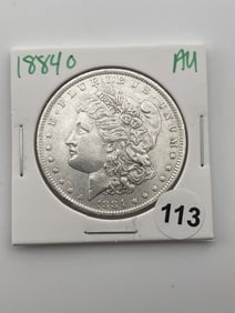 1884 O AU Morgan Silver Dollar Coin
