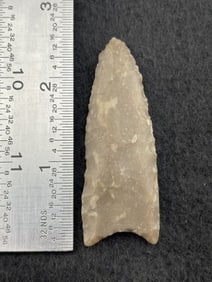 Clovis paleo point with long flute, heavy ground base - medium brown Edwards Plateau chert. Booker