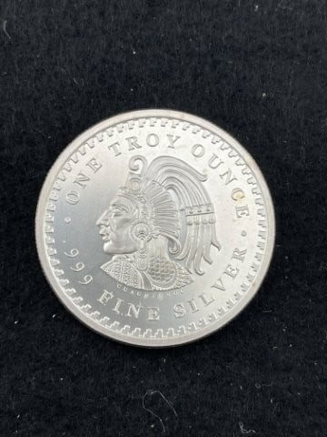 1 Ounce .999 Fine Silver Coin (1 of 2)