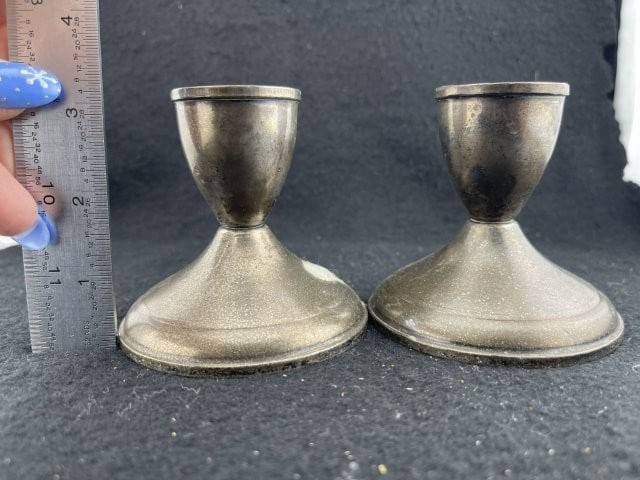 Pair of Sterling Silver Weighted Candle Holders: KEY WORDS: INDIAN ARTIFACT ARTIFACTS ARROWHEAD ARROWHEADS NATIVE AMERICAN MISSISSIPPIAN QUAPAW CADDO POTTERY COINS MORGAN DOLLAR PEACE DOLLAR SILVER COINS. All coins have been Sigma tested for