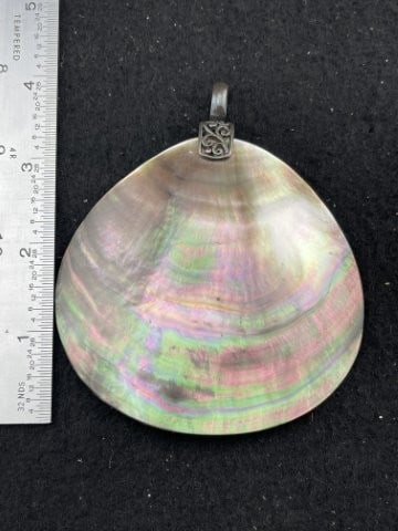 Shell Pendant with Sterling Bracket: KEY WORDS: INDIAN ARTIFACT ARTIFACTS ARROWHEAD ARROWHEADS NATIVE AMERICAN MISSISSIPPIAN QUAPAW CADDO POTTERY COINS MORGAN DOLLAR PEACE DOLLAR SILVER COINS. All coins have been Sigma tested for