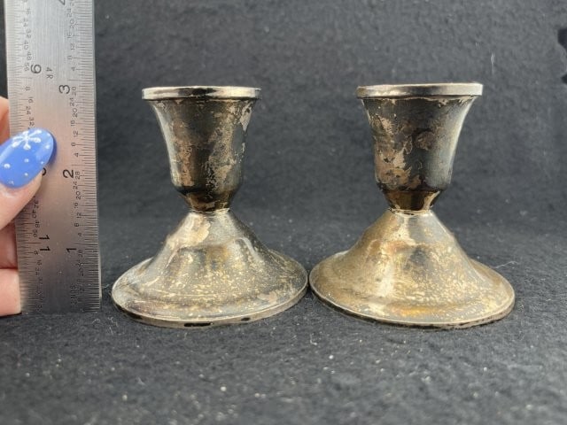 Pair of Sterling Silver Weighted Candle Holders: KEY WORDS: INDIAN ARTIFACT ARTIFACTS ARROWHEAD ARROWHEADS NATIVE AMERICAN MISSISSIPPIAN QUAPAW CADDO POTTERY COINS MORGAN DOLLAR PEACE DOLLAR SILVER COINS. All coins have been Sigma tested for