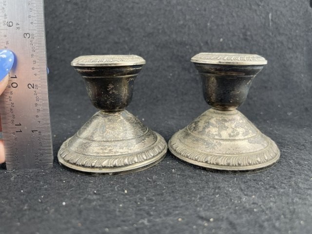 Pair of Sterling Silver Weighted Candle Holders: KEY WORDS: INDIAN ARTIFACT ARTIFACTS ARROWHEAD ARROWHEADS NATIVE AMERICAN MISSISSIPPIAN QUAPAW CADDO POTTERY COINS MORGAN DOLLAR PEACE DOLLAR SILVER COINS. All coins have been Sigma tested for