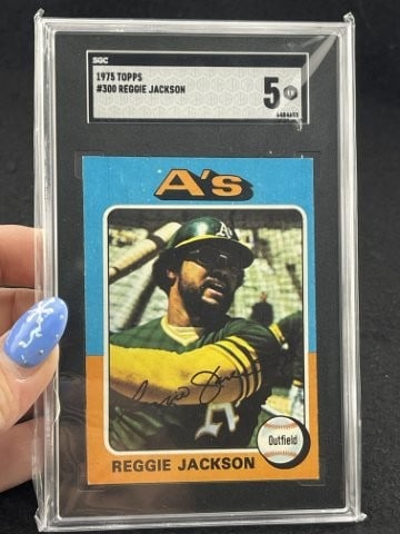 1975 Topps Reggie Jackson Baseball Card: KEY WORDS: INDIAN ARTIFACT ARTIFACTS ARROWHEAD ARROWHEADS NATIVE AMERICAN MISSISSIPPIAN QUAPAW CADDO POTTERY COINS MORGAN DOLLAR PEACE DOLLAR SILVER COINS. All coins have been Sigma tested for
