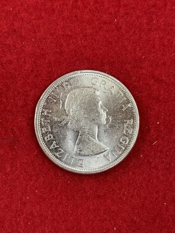 Canadian Silver Dollar: KEY WORDS: INDIAN ARTIFACT ARTIFACTS ARROWHEAD ARROWHEADS NATIVE AMERICAN MISSISSIPPIAN QUAPAW CADDO POTTERY COINS MORGAN DOLLAR PEACE DOLLAR SILVER COINS. All coins have been Sigma tested for