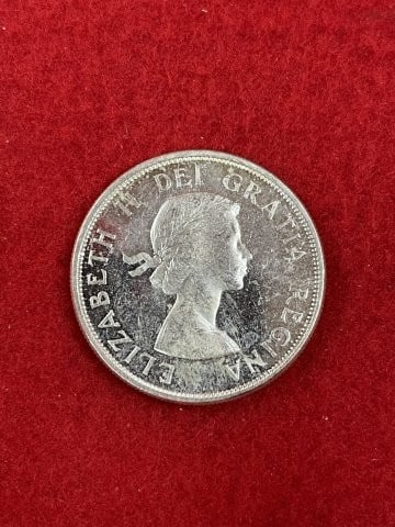 Canadian Silver Dollar: KEY WORDS: INDIAN ARTIFACT ARTIFACTS ARROWHEAD ARROWHEADS NATIVE AMERICAN MISSISSIPPIAN QUAPAW CADDO POTTERY COINS MORGAN DOLLAR PEACE DOLLAR SILVER COINS. All coins have been Sigma tested for