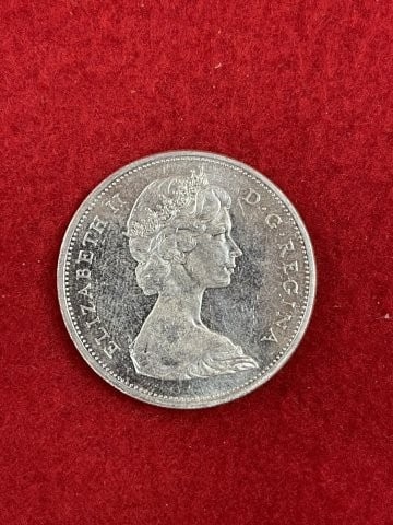 Canadian Silver Dollar: KEY WORDS: INDIAN ARTIFACT ARTIFACTS ARROWHEAD ARROWHEADS NATIVE AMERICAN MISSISSIPPIAN QUAPAW CADDO POTTERY COINS MORGAN DOLLAR PEACE DOLLAR SILVER COINS. All coins have been Sigma tested for