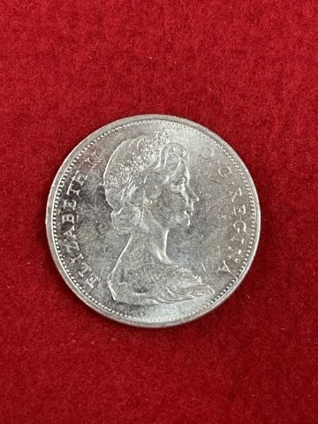 Canadian Silver Dollar: KEY WORDS: INDIAN ARTIFACT ARTIFACTS ARROWHEAD ARROWHEADS NATIVE AMERICAN MISSISSIPPIAN QUAPAW CADDO POTTERY COINS MORGAN DOLLAR PEACE DOLLAR SILVER COINS. All coins have been Sigma tested for authent