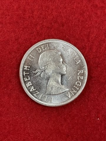 Canadian Silver Dollar: KEY WORDS: INDIAN ARTIFACT ARTIFACTS ARROWHEAD ARROWHEADS NATIVE AMERICAN MISSISSIPPIAN QUAPAW CADDO POTTERY COINS MORGAN DOLLAR PEACE DOLLAR SILVER COINS. All coins have been Sigma tested for authent