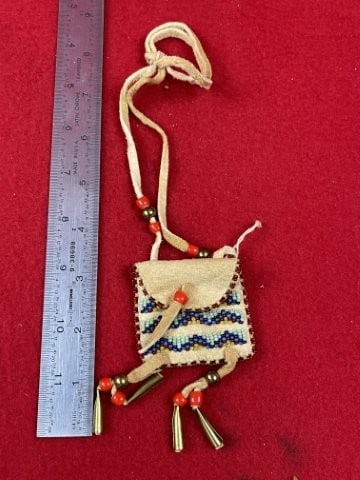 Beaded Leather Pouch: KEY WORDS: INDIAN ARTIFACT ARTIFACTS ARROWHEAD ARROWHEADS NATIVE AMERICAN MISSISSIPPIAN QUAPAW CADDO POTTERY COINS MORGAN DOLLAR PEACE DOLLAR SILVER COINS. All coins have been Sigma tested for