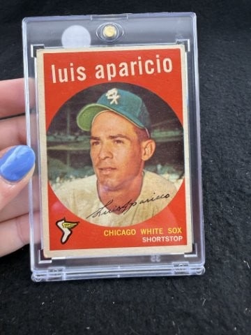1959 Topps Luis Aparicio Baseball Card: KEY WORDS: INDIAN ARTIFACT ARTIFACTS ARROWHEAD ARROWHEADS NATIVE AMERICAN MISSISSIPPIAN QUAPAW CADDO POTTERY COINS MORGAN DOLLAR PEACE DOLLAR SILVER COINS. All coins have been Sigma tested for authent