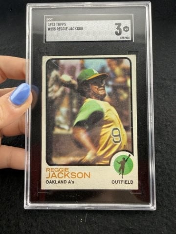 1973 Topps Reggie Jackson Baseball Card: KEY WORDS: INDIAN ARTIFACT ARTIFACTS ARROWHEAD ARROWHEADS NATIVE AMERICAN MISSISSIPPIAN QUAPAW CADDO POTTERY COINS MORGAN DOLLAR PEACE DOLLAR SILVER COINS. All coins have been Sigma tested for authent