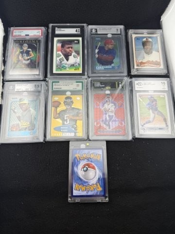 Group of Assorted Slabbed Football Baseball Pok?mon Cards: KEY WORDS: INDIAN ARTIFACT ARTIFACTS ARROWHEAD ARROWHEADS NATIVE AMERICAN MISSISSIPPIAN QUAPAW CADDO POTTERY COINS MORGAN DOLLAR PEACE DOLLAR SILVER COINS. All coins have been Sigma tested for