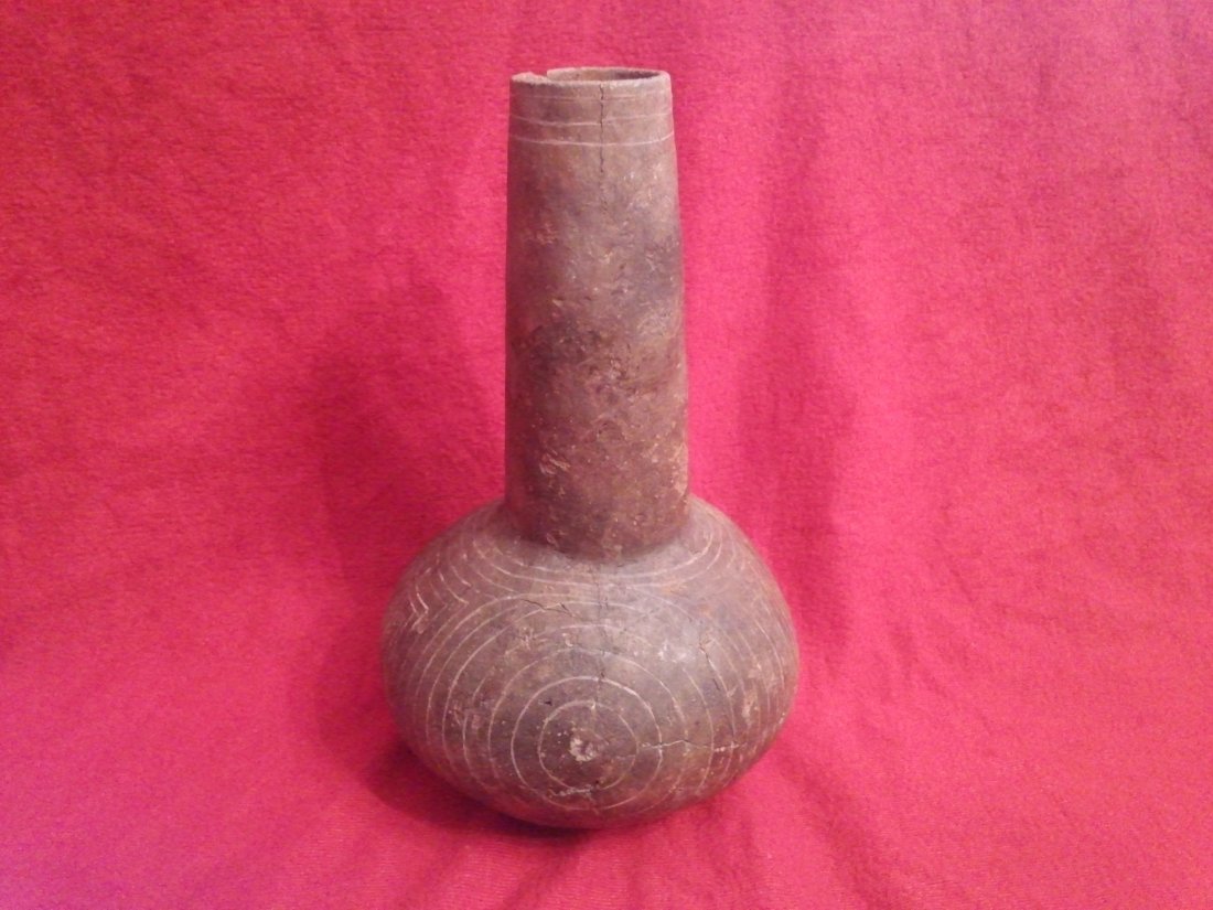 CADDO HOLLY FINE WATERBOTTLE: 8&3/4'T 5&1/2'W BROKEN & GLUED FROM MILLER CO., AR FOUND BY GLEN KIZZA ON THE CRENSHAW SITE EX- GLEN KIZZA, SAM JOHNSON, KEN PARTAIN, KEVIN PIPES, GEORGE HECKMAN (G807) JACK BONDS COLLECTIONS HAS A KE