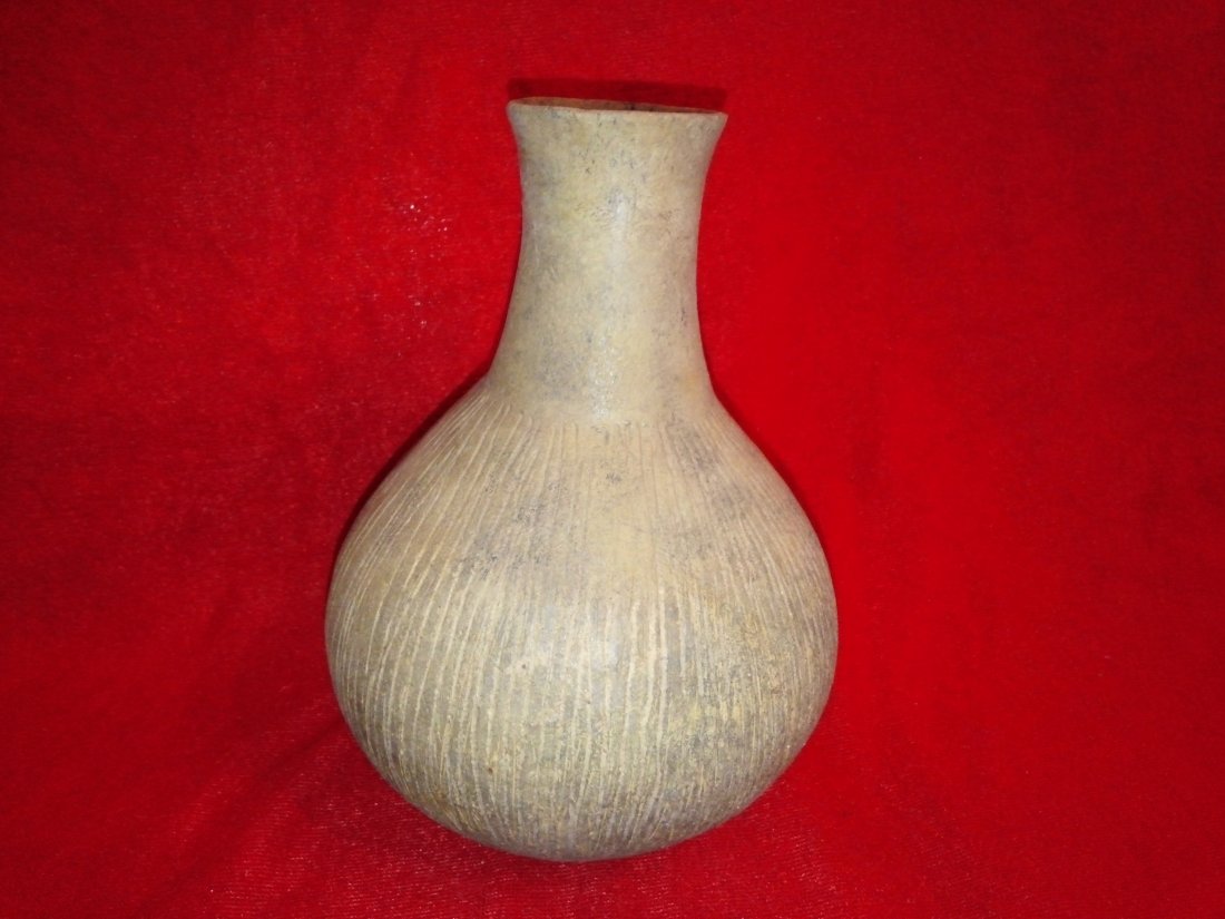 CADDO INCISED WATERBOTTLE: 7'T 5&1/8'W MINOR RESTORATION FROM RED RIVER CO., TX EX- RICK ASHLEY, DR WESTBROOK, SAM JOHNSON, & JACK BONDS COLLECTION PICTURED IN "ART OF THE ANCIENT CADDO" PG69 FIG128 HAS KEN PARTAIN COA