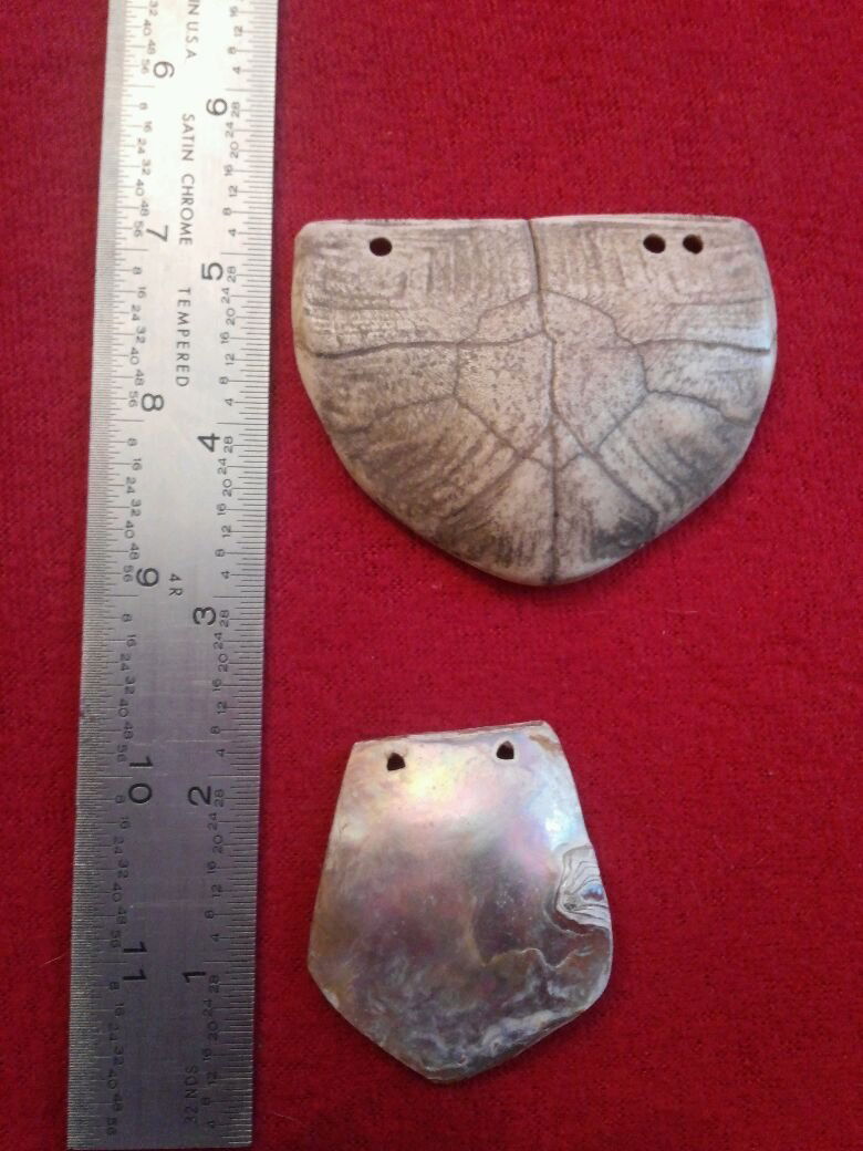 (2) PENDANTS: ONE MADE OF ABALONE SHELL THE OTHER ONE IS TURTLE SHELL